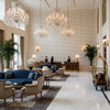 8024115.1615.0 | Kravet - Hotel Lobby Visualization (AI-generated, may not be to scale. Verify pattern scale with product specifications.)