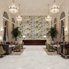 LAURA Fabrics (AF23101) – Lavender and Green | Thibaut - Hotel Lobby Visualization (AI-generated, may not be to scale. Verify pattern scale with product specifications.)