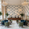 WINTER BUD Fabrics (AF23135) – Blue | Thibaut - Hotel Lobby Visualization (AI-generated, may not be to scale. Verify pattern scale with product specifications.)