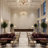 LINDSEY Fabrics (AF57809) – Sand | Thibaut - Hotel Lobby Visualization (AI-generated, may not be to scale. Verify pattern scale with product specifications.)