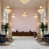 LINDSEY Fabrics (AF57811) – Lavender | Thibaut - Hotel Lobby Visualization (AI-generated, may not be to scale. Verify pattern scale with product specifications.)