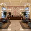 PALAMPORE Fabrics (AF78726) – Red and Blue | Thibaut - Hotel Lobby Visualization (AI-generated, may not be to scale. Verify pattern scale with product specifications.)
