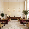 BR-81081.LLQ.0 | Kravet - Hotel Lobby Visualization (AI-generated, may not be to scale. Verify pattern scale with product specifications.)