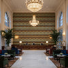 BR-89569.MMM.0 | Kravet - Hotel Lobby Visualization (AI-generated, may not be to scale. Verify pattern scale with product specifications.)
