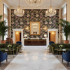 Mitford Black And Plum Printed Fabrics Black and Plum | Thibaut - Hotel Lobby Visualization (AI-generated, may not be to scale. Verify pattern scale with product specifications.)
