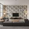 Trea Taupe Tropical Cream & Taupe Wallcovering | Jeffrey Stevens - Living Room Visualization (AI-generated, may not be to scale. Verify pattern scale with product specifications.)