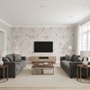 Silk Road Dogwood Traditional Floral Metallic Silver and Strawberry | Architectural Wallcoverings - Living Room Visualization (AI-generated, may not be to scale. Verify pattern scale with product specifications.)