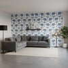 ELEPHANT Navy | Thibaut Wallcoverings - Living Room Visualization (AI-generated, may not be to scale. Verify pattern scale with product specifications.)