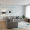 ELEPHANT French Blue | Thibaut Wallcoverings - Living Room Visualization (AI-generated, may not be to scale. Verify pattern scale with product specifications.)