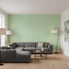 PALAWAN Green | Thibaut Wallcoverings - Living Room Visualization (AI-generated, may not be to scale. Verify pattern scale with product specifications.)