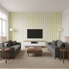 Wallis Stripe Celery | Schumacher Wallcovering - Living Room Visualization (AI-generated, may not be to scale. Verify pattern scale with product specifications.)
