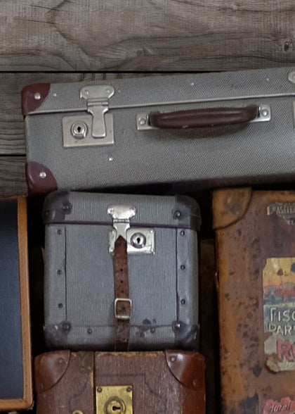Stacked Suitcases | Rebel Walls